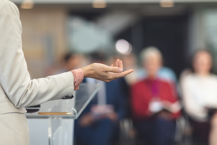 Female speaker speaks in a business seminar Speaking by Justine Lamont - Parent Coach - Good to Great Parenting